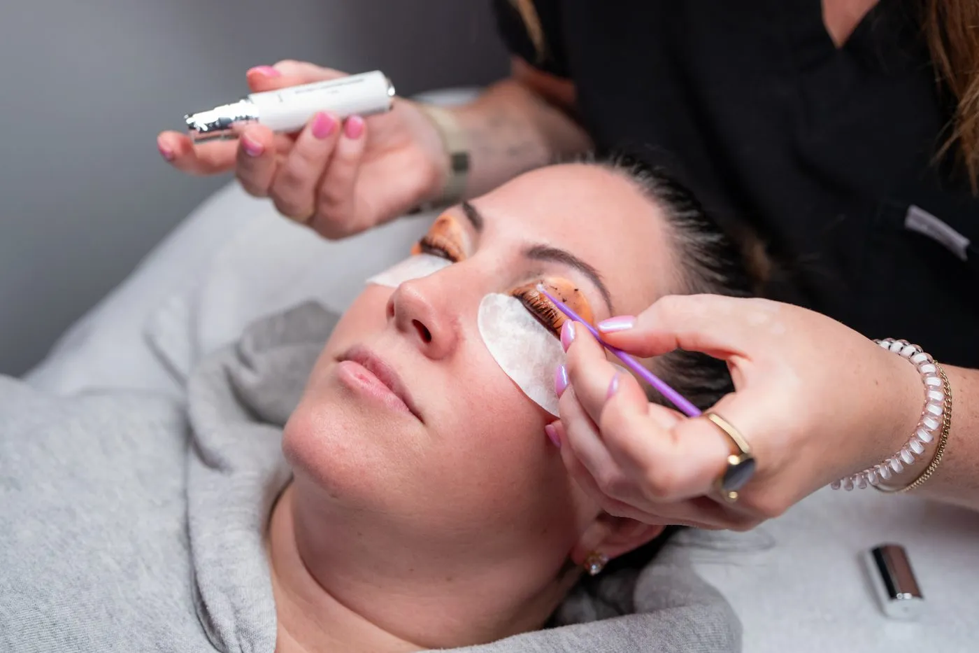 Classic lash extensions being applied at Raw Glo Med Spa in Waukesha, WI