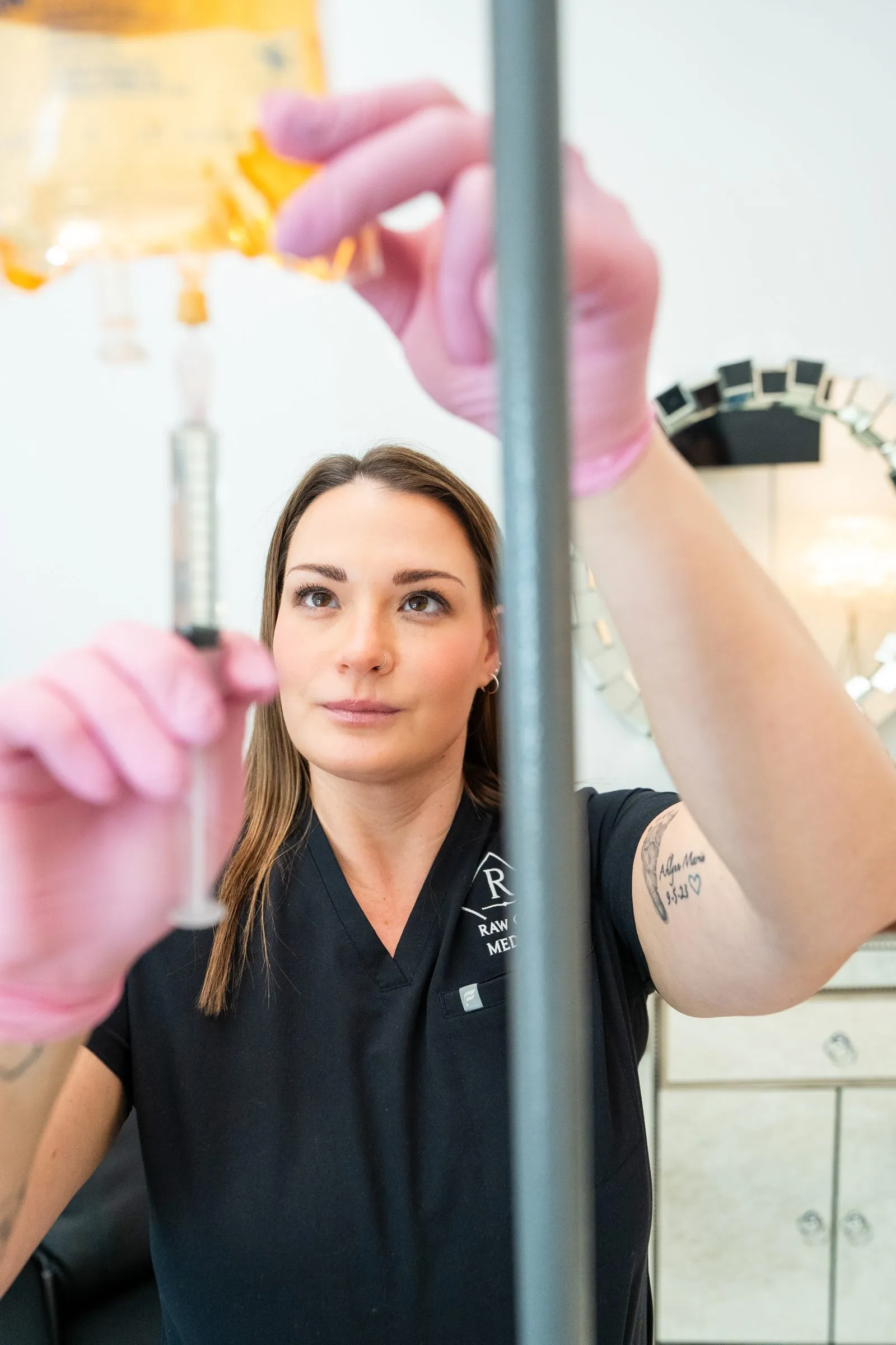 A vitamin injection being prepared at Raw Glo Med Spa in Waukesha, WI