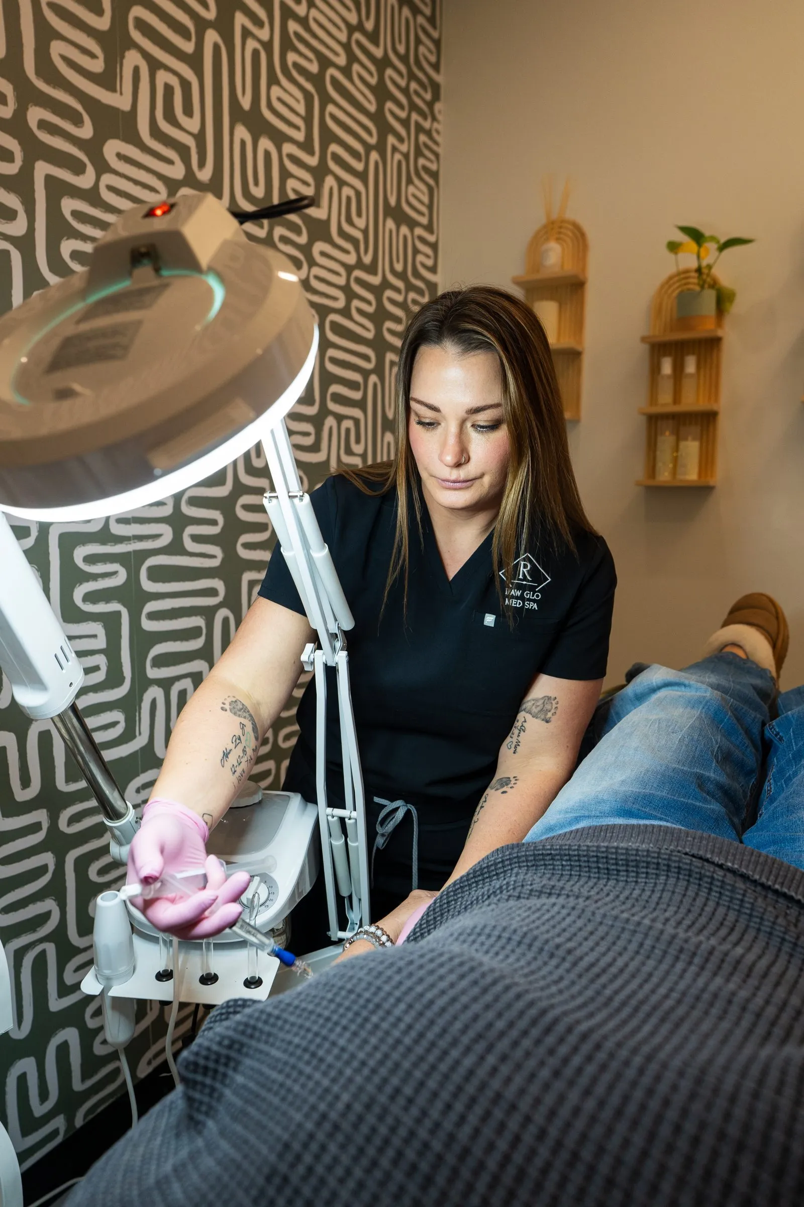 A microneedling treatment underway in a dedicated room